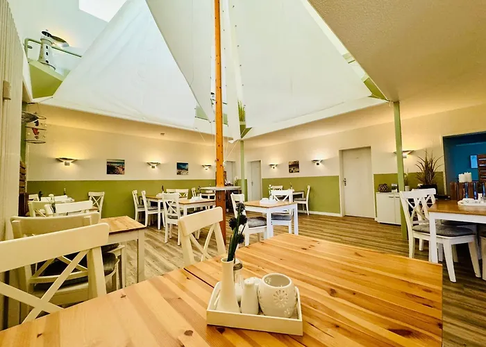 فندق Strandhaus Moenchgut Lobbe