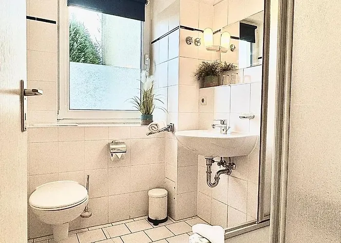 فندق Strandhaus Moenchgut Lobbe